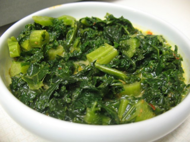 I don't know what the vegetable is here, might be yu choi. Reminded me of collard greens but in a coconut curry sauce. Very nice. I should note this was only 1/3 of one of the variety packs on rice for $6