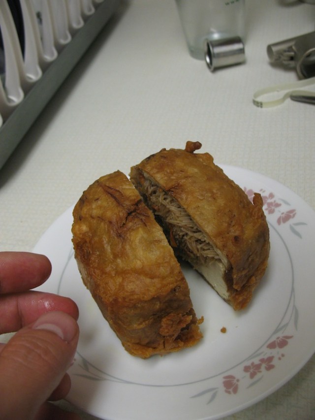 More deep-fried things. There is such a variety. Here I selected a HUGE stuffed tofu. I cut it in half.